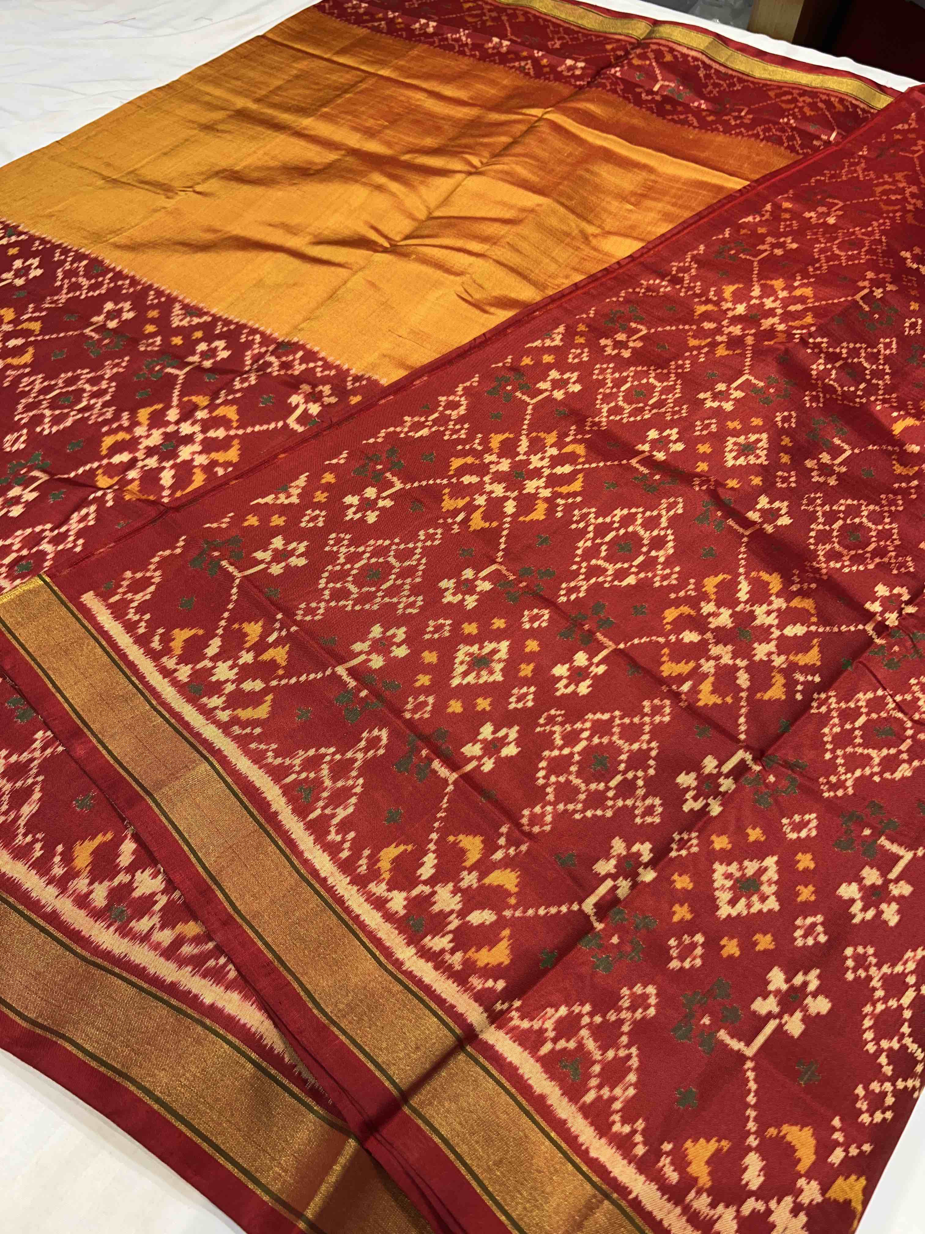 Handwoven Patola Silk Saree Scut Border Navratna