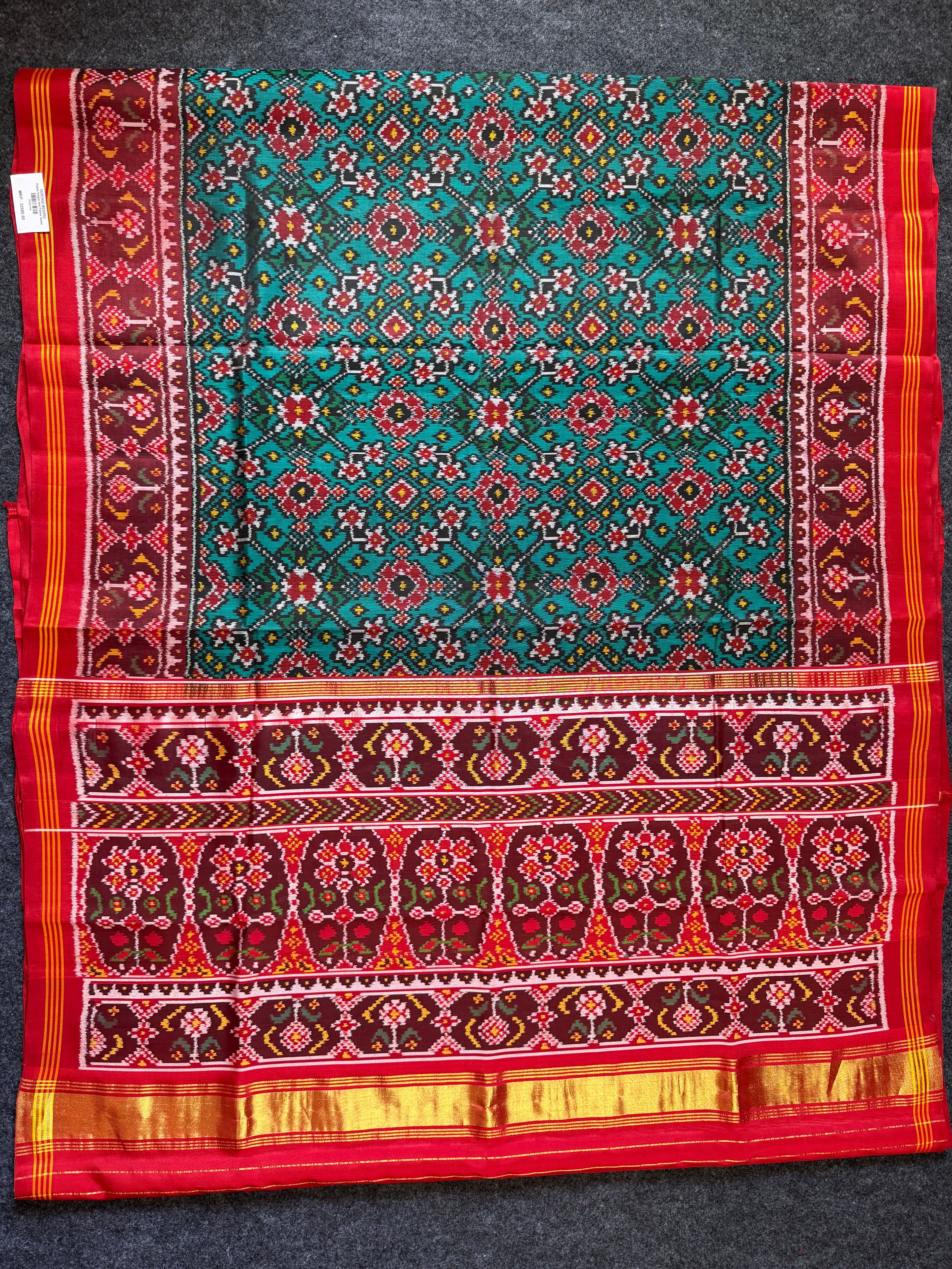 Rama Green Navratna Traditional Design Handwoven Patola Silk Saree