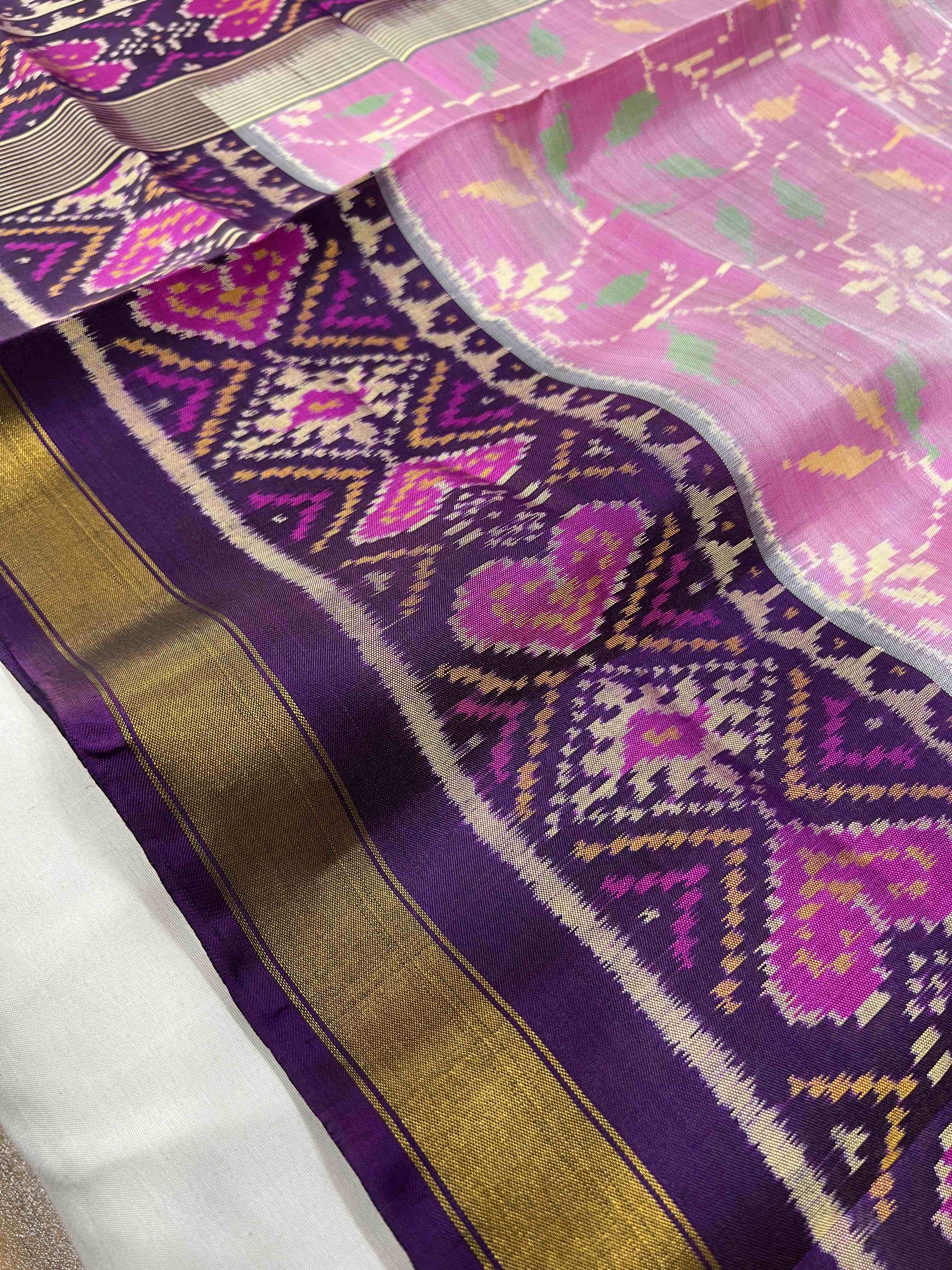 Baby-pink and purple Fancy Design Handwoven Patola Silk Saree