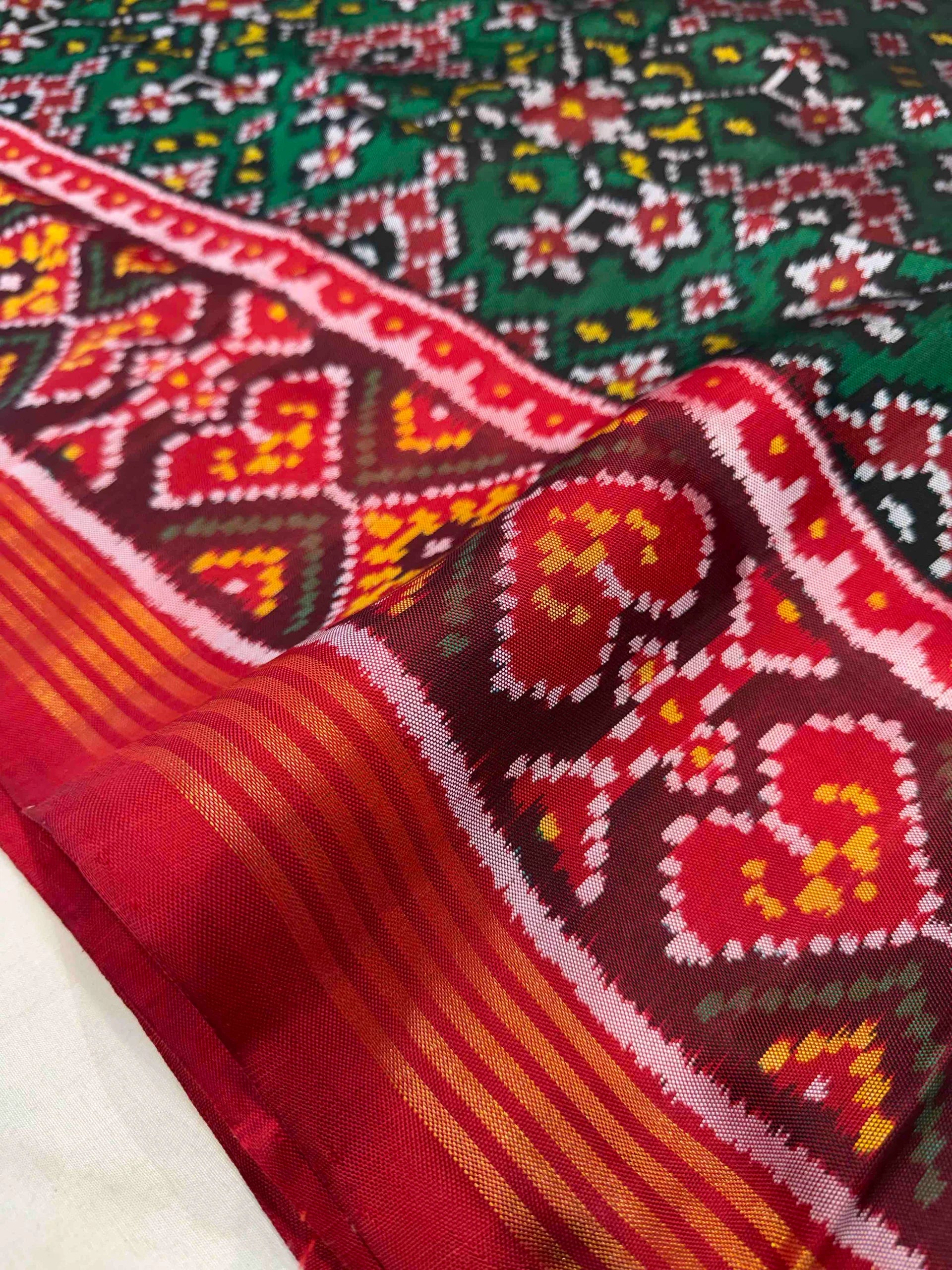 Green Navratna Design Handwoven Patola Silk Saree